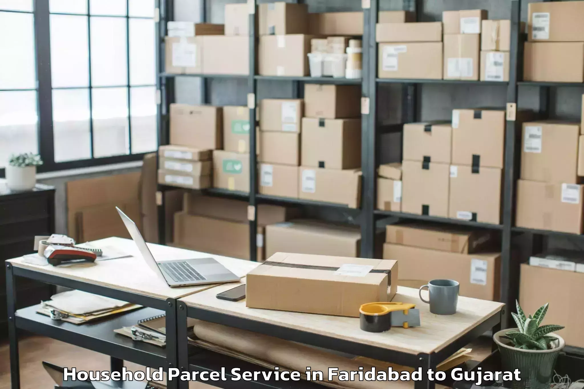 Easy Faridabad to Marwadi University Rajkot Household Parcel Booking